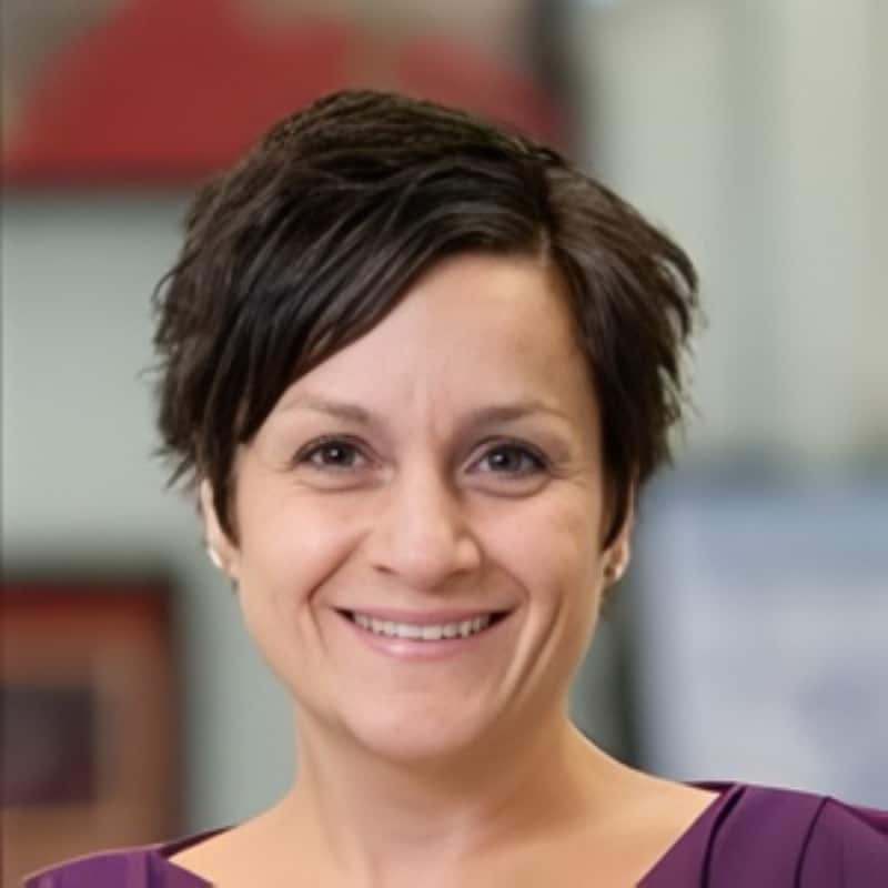 dr-eser-tufekci-vao Orthodontist smiling in professional headshot for Virginia Association of Orthodontists